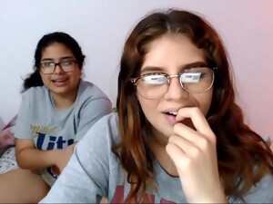 Two Nerdy Latinas Playing With Their Pussies On Cam